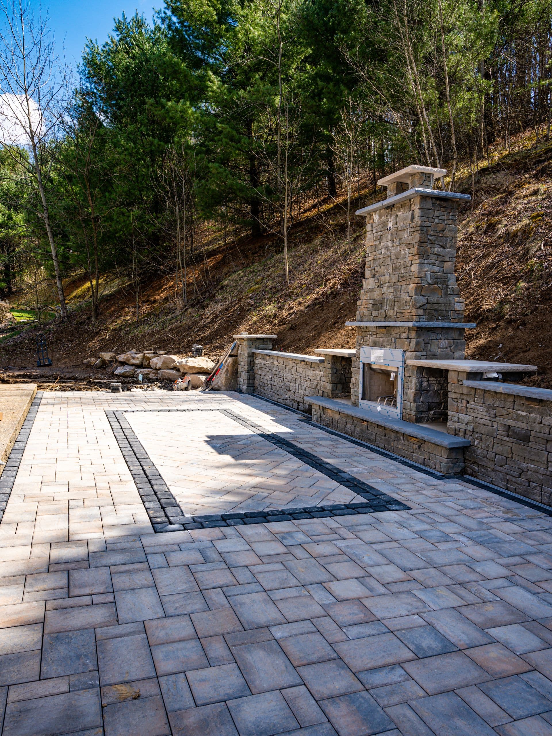 Outdoor fireplace on a paver patio